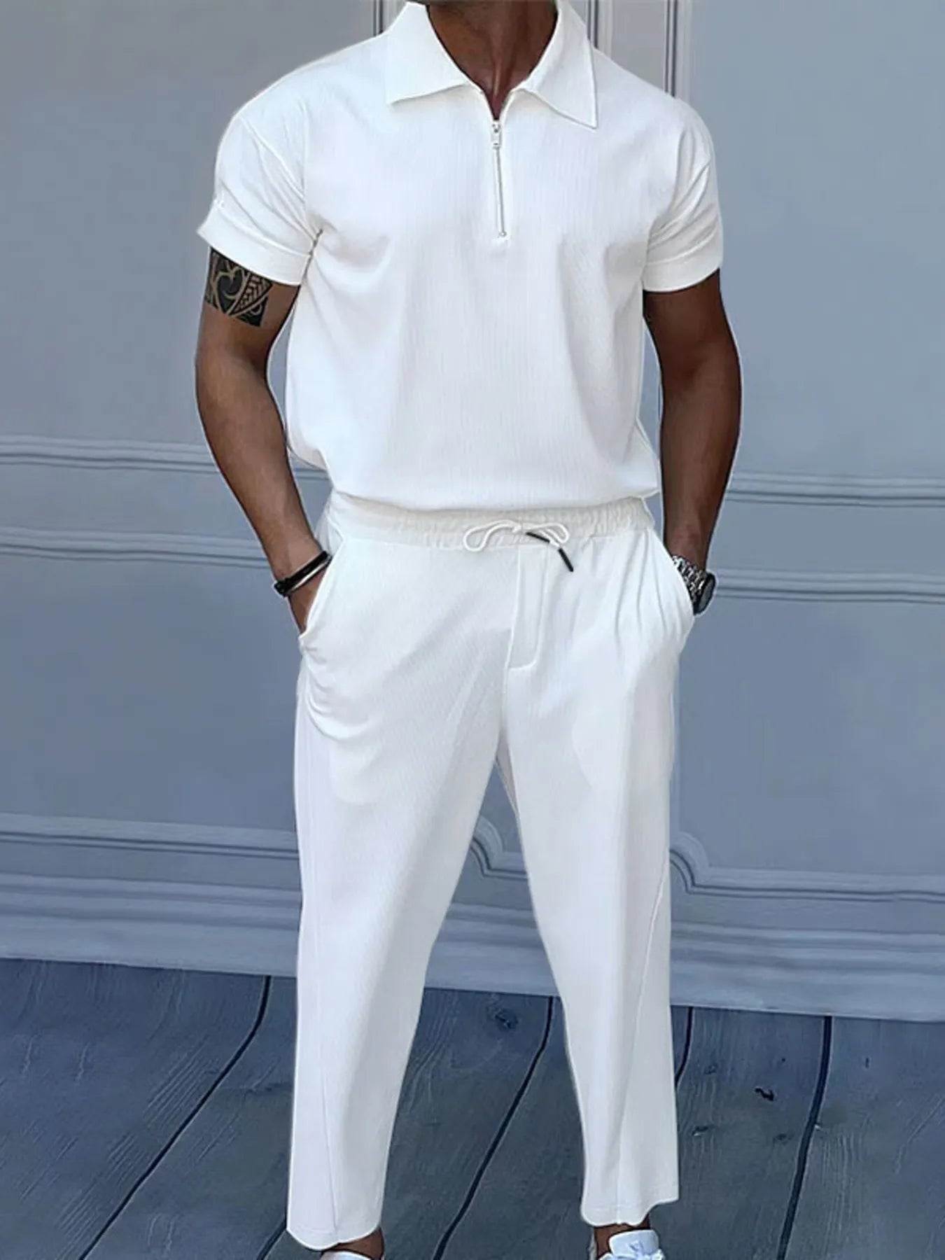 
                  
                    Men's Full Size Quarter Zip Short Sleeve Polo and Pants Set Plus Size.
                  
                