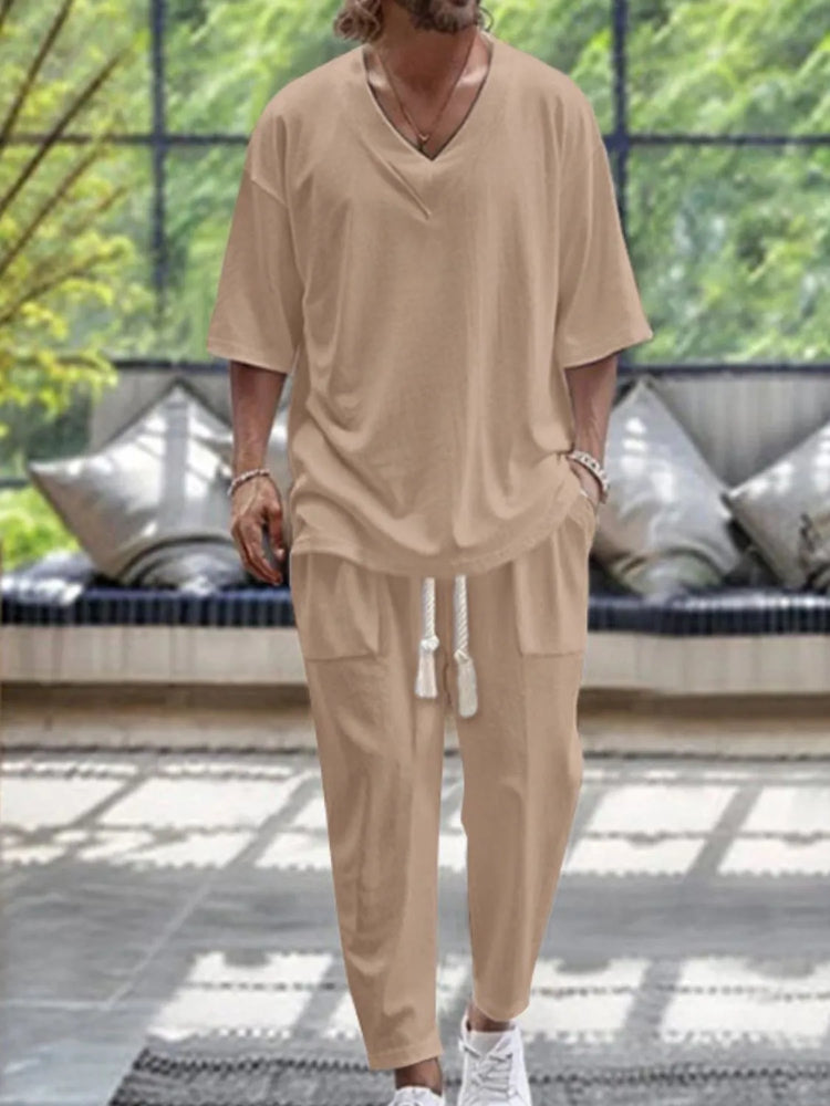 
                  
                    Men's V-Neck Half Sleeve Top and Pants Set.
                  
                