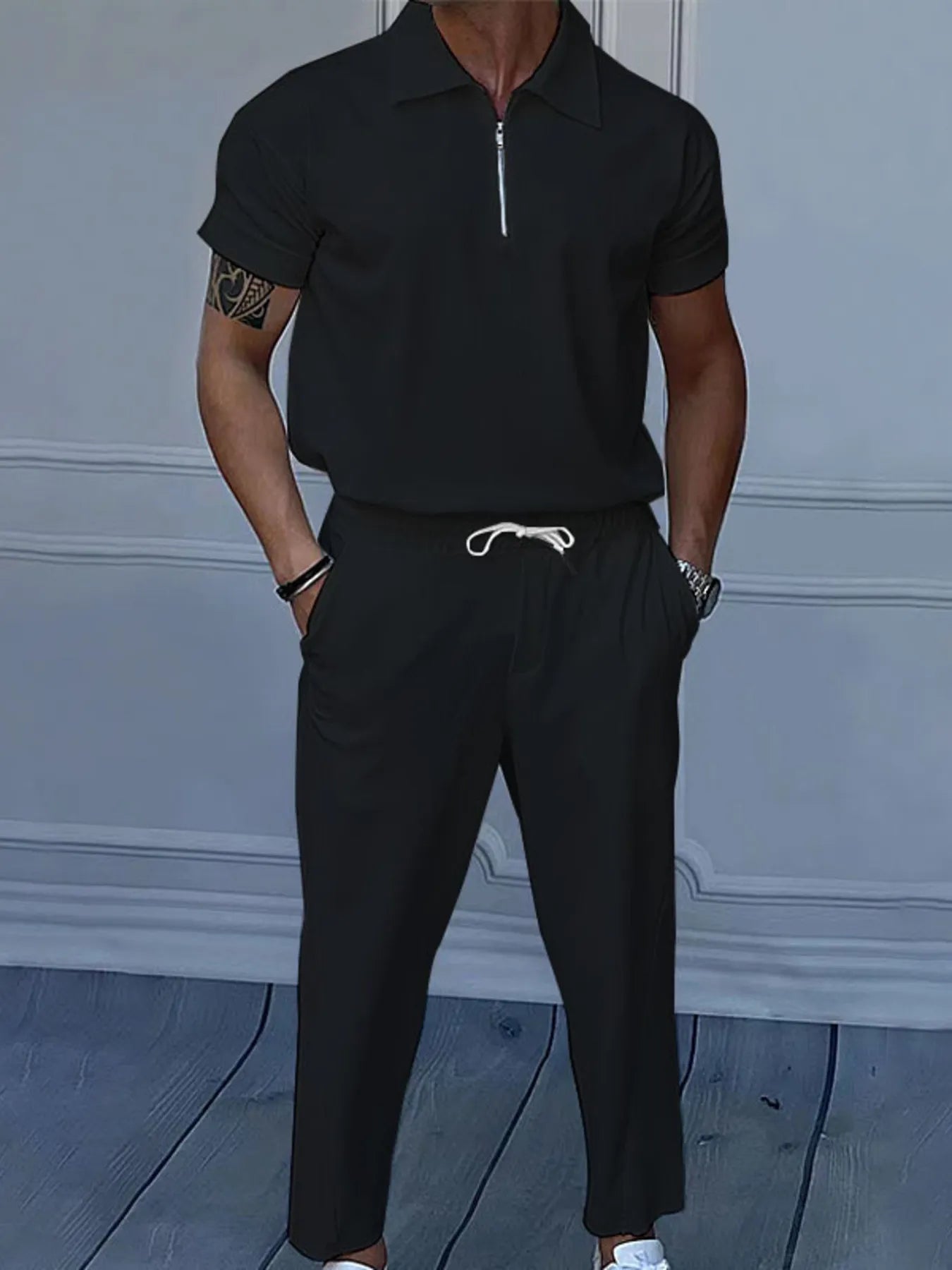 
                  
                    Men's Full Size Quarter Zip Short Sleeve Polo and Pants Set Plus Size.
                  
                