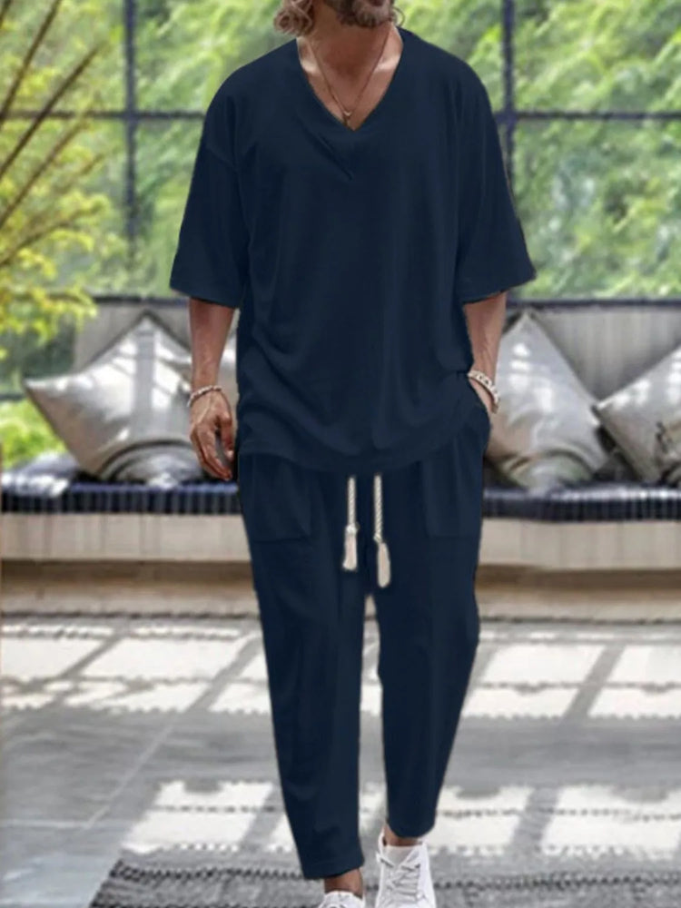 
                  
                    Men's V-Neck Half Sleeve Top and Pants Set.
                  
                