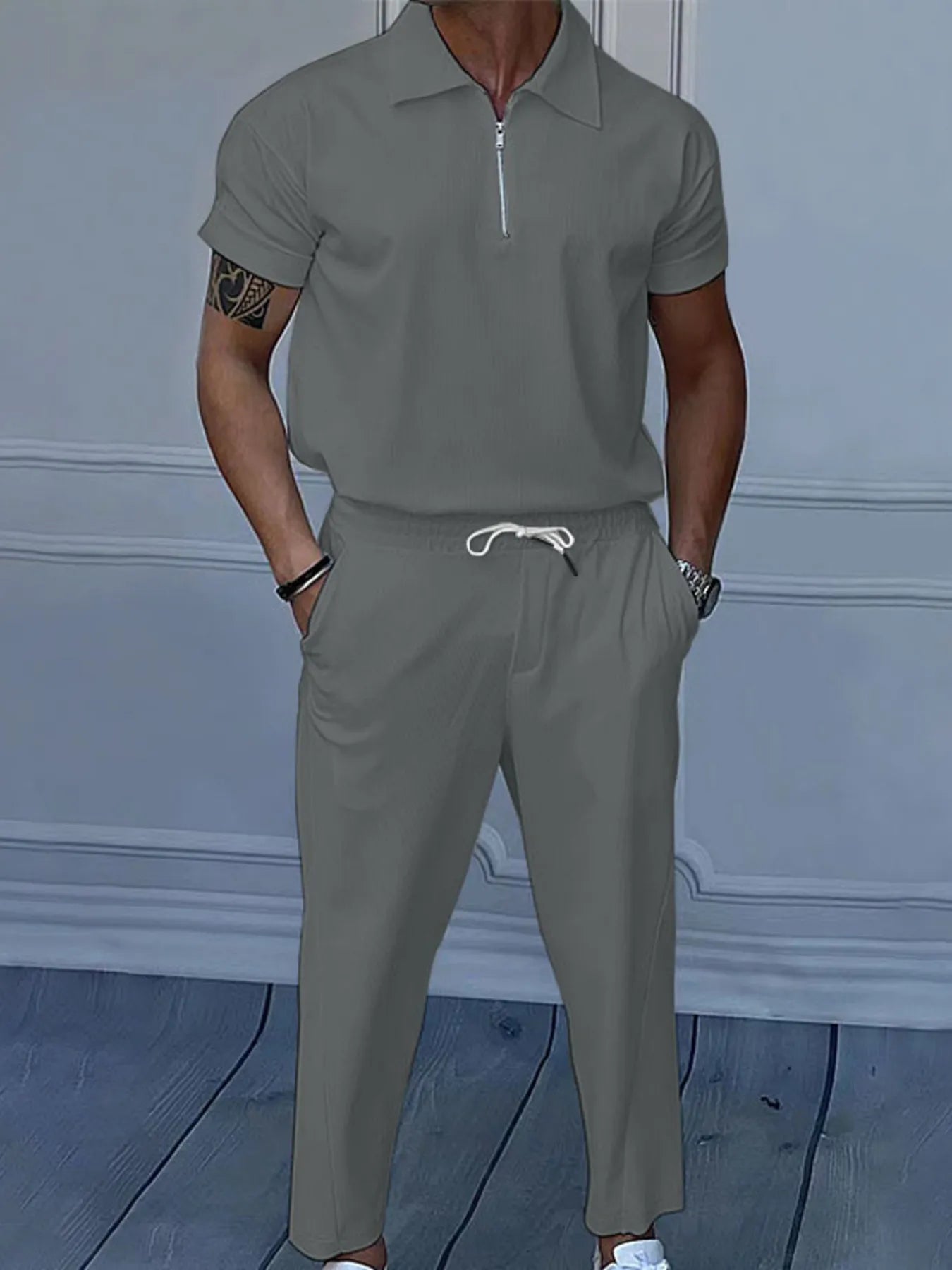 
                  
                    Men's Full Size Quarter Zip Short Sleeve Polo and Pants Set Plus Size.
                  
                