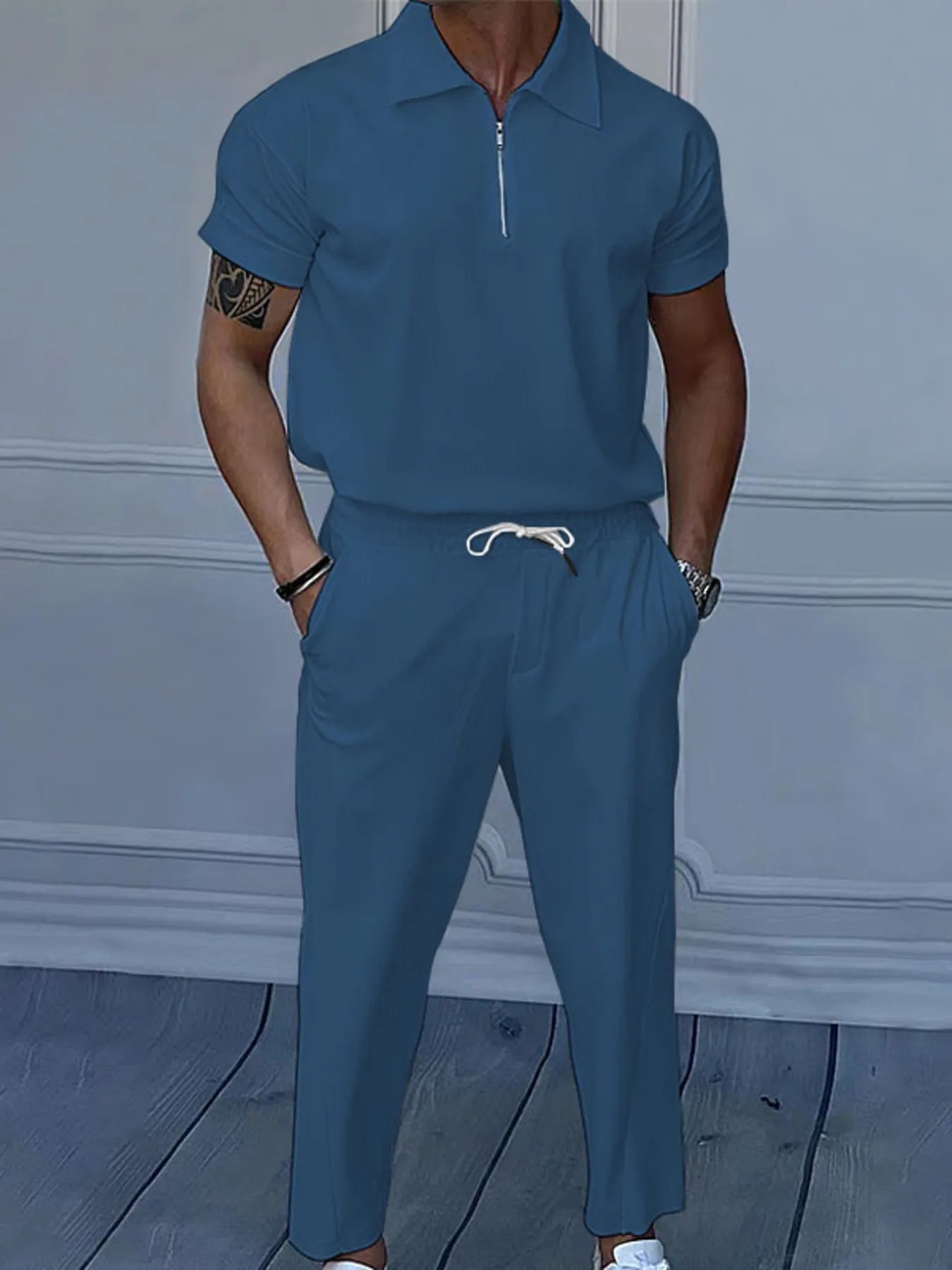 
                  
                    Men's Full Size Quarter Zip Short Sleeve Polo and Pants Set Plus Size.
                  
                