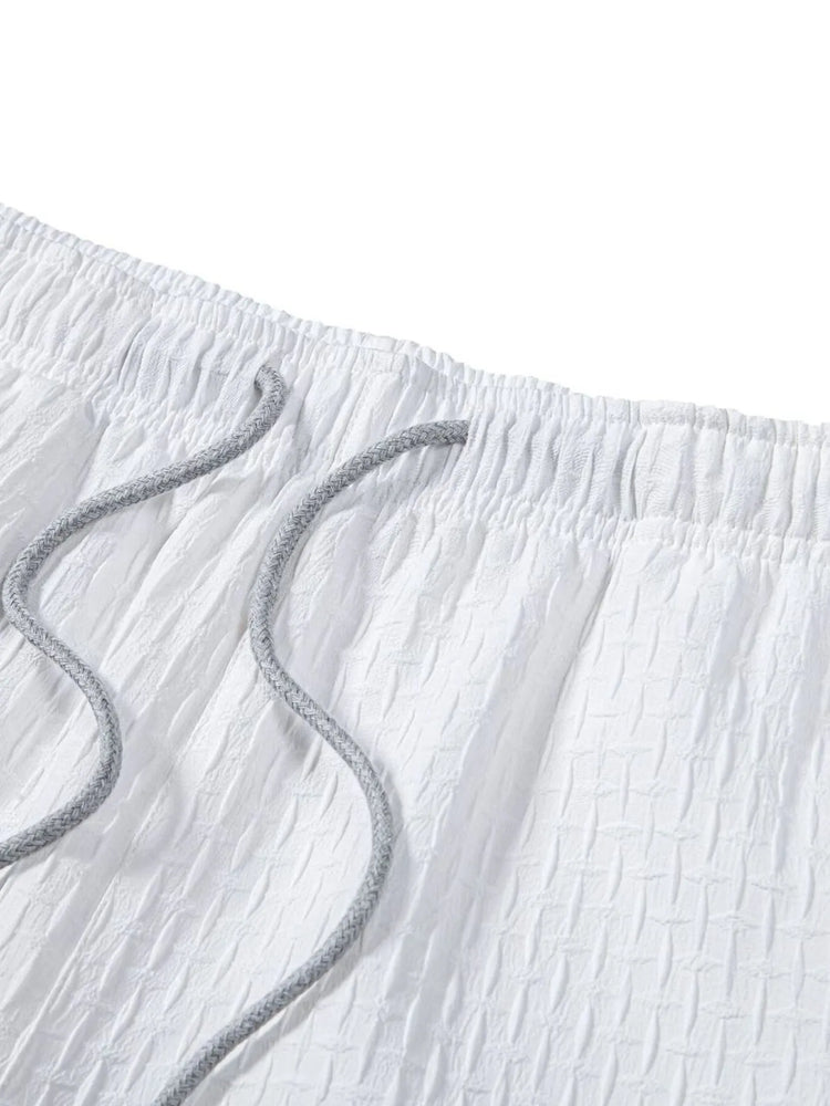 
                  
                    Men's Classic Textured Shorts with Elastic Waist.
                  
                